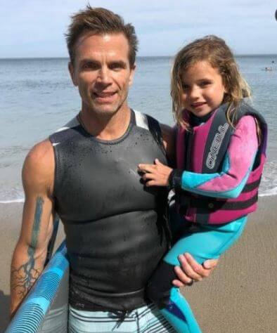 Susan Brubaker husband David Chokachi with their daughter on the beach.